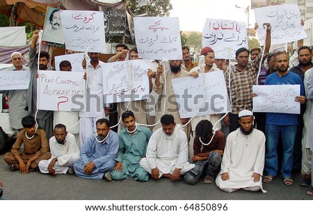 KARACHI, PAKISTAN - NOV 09: Activists of Human Rights Network (HRN) protest in favor of their demands during a demonstration at Karachi press club on 09 November 2010 in Karachi.