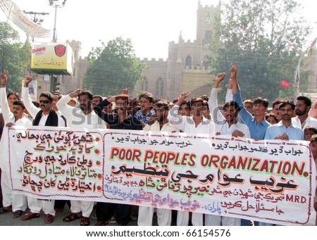 HYDERABAD, PAKISTAN - NOV 28: Activists of Poor People organization chant slogans in favor of their demands during a protest demonstration at Hyderabad press club on November 28, 2010 in Hyderabad.