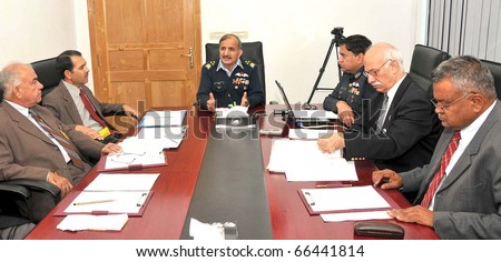 ISLAMABAD, PAKISTAN - DEC 02: Ski Federation President, Air Marshal Tahir Rafique Butt, Air Force vice-Chief of the Air Staff, presides executive committee meeting on December 02, 2010 in Islamabad, Pakistan.