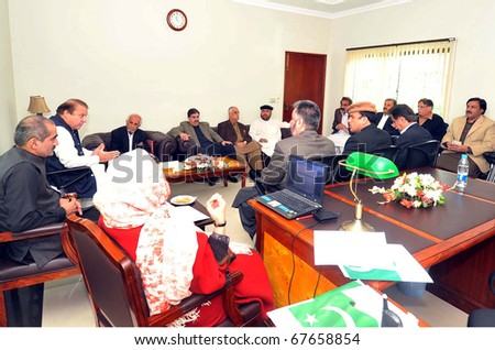 LAHORE, PAKISTAN, DEC 21: Muslim League-N Chief, Nawaz Sharif in meeting with PML- N Balochistan Organizing Committee members, Sardar Yaqoob Nasir, and other on December 21, 2010 in Lahore, Pakistan.