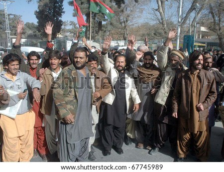 QUETTA, PAKISTAN - DEC 23: Activists of Jamhori Watan Party (JWP) are protesting against arrest of Shah Zain Bugti during demonstration at Commissioner office on December 23, 2010 in Quetta.