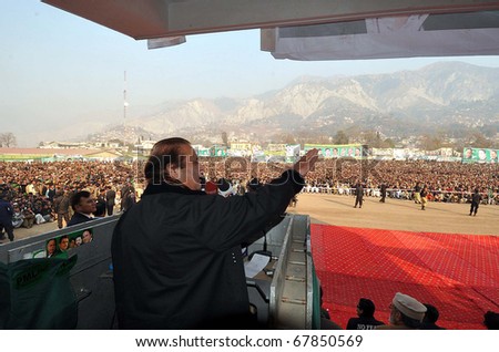 MUZAFFARABAD, PAKISTAN - DEC 26: Muslim League-N Chief, Nawaz Sharif, addresses public gathering on occasion of inauguration ceremony of PML-N establishment held on December 26, 2010 in Muzaffarabad.