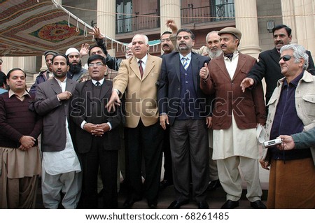 LAHORE, PAKISTAN - JAN 03: Lawmakers of Muslim League-N are protesting against increase in petroleum prices during demonstration at Punjab Assembly building on January 03, 2011in Lahore.