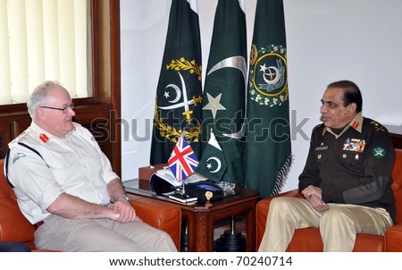 RAWALPINDI, PAKISTAN - JAN 31: Chief of the Army Staff, Gen.Ashfaq Pervez Kayani talks with Gen.Sir Peter Wall, Chief of General Staff, United Kingdom during meeting on January 31, 2011in Rawalpindi.