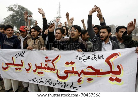 PESHAWAR, PAKISTAN - FEB 03: Activists of Muslim Students Federation chant slogans during Yakjehti (Solidarity) Kashmir rally on February 03, 2011in Peshawar.