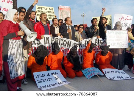 ISLAMABAD, PAKISTAN - FEB 06: Leaders and supporters of Defence of Human Rights (DHR) chant slogans for recovery of missing persons during protest demonstration on February 09, 2011in Islamabad.