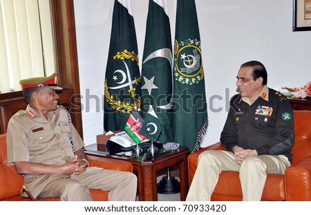 RAWALPINDI, PAKISTAN - FEB 10: Chief of the Army Staff, Gen.Ashfaq Pervez Kayani exchanges views with Chief of General Staff Gen.Jeremiah Mutinda Kianga on February 10, 2011 in Rawalpindi.