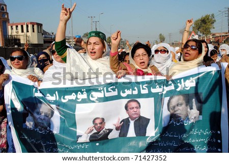 PESHAWAR, PAKISTAN - FEB 17: Leaders and activists of Muslim League-N chant slogans in favor of ten-point-Agenda of Nawaz Sharif during protest demonstration on February 17, 2011in Peshawar.