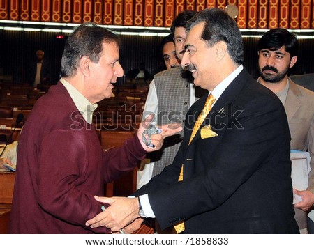 ISLAMABAD, PAKISTAN - FEB 23: Prime Minister, Syed Yousuf Raza Gilani, talks with Muslim League-N Senior Leader, Makhdoom Javed Hashmi during assembly session on February 23, 2011 in Islamabad.