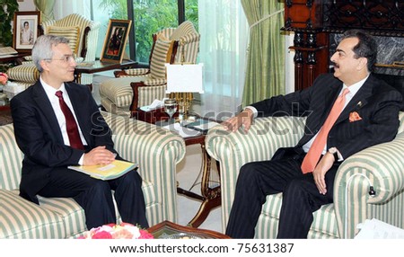 ISLAMABAD, PAKISTAN - APR 19: Syed Yousuf Raza Gilani, talks with Special Envoy of the UN Secretary General for Assistance to Pakistan, Rauf Engin Soysal during meeting on April 19, 2011 in Islamabad.