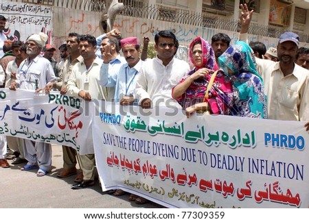 HYDERABAD, PAKISTAN - MAY 15: Supporters of Human Rights Development Organization (HRDO) protest against price-hiking during a demonstration press club on May 15, 2011in Hyderabad.