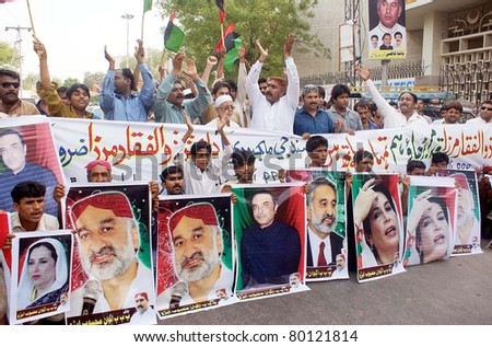 HYDERABAD, PAKISTAN - JUN 28: Leader and activists of Peoples Party (PPP) chant slogans in favor of Dr.Zulfiqar Mirza during rally on June 28, 2011in Hyderabad, Pakistan.