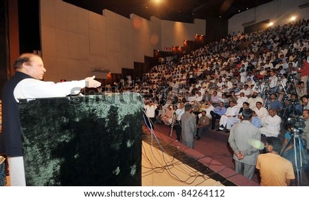LAHORE, PAKISTAN, SEPT 07: Muslim League-N President, Nawaz Sharif addresses a public meeting on occasion of the Yellow Cab Scheme Draws held in Lahore on Wednesday, September 07, 2011.