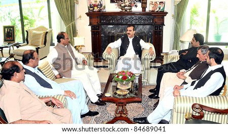 ISLAMABAD, PAKISTAN - SEPT. 14: Prime Minister, Syed Yousuf Raza Gilani in meeting with Muslim League-Q President, Ch.Shujaat Hussain at PM House in Islamabad, Pakistan on September 14, 2011.