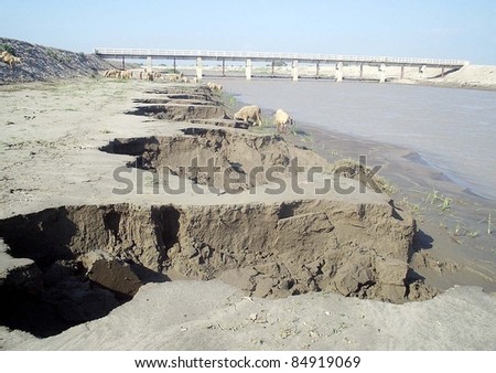 UBAURO, PAKISTAN - SEPT 17: View of cracks at safety wall of Reni Canal due to recent heavy downpour of Monsoon season needs the attention of concerned department on September 17, 2011 in Ubauro.