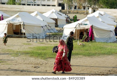 MIRPURKHAS, PAKISTAN - SEPT 18: Rain affected people are living in make-shift tent houses at a relief camp established on September 18, 2011 in Mirpurkhas .