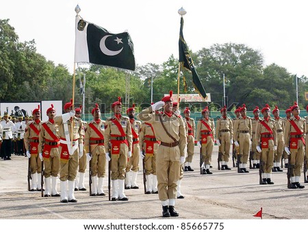 HYDERABAD, PAKISTAN - SEPT 29: Recruits march-past during the passing out parade ceremony held at Sindh Regimental Centre on September 29, 2011in Hyderabad.