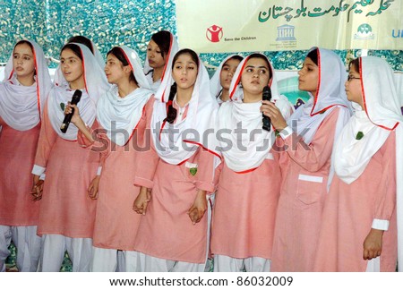 QUETTA, PAKISTAN - OCT 05: Unidentified students present National Songs during ceremony arranged by provincial education department on occasion of the World Teachers Day held on Oct 05, 2011 in Quetta