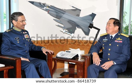 ISLAMABAD, PAKISTAN - OCT 11: Air Force Chief of the Air Staff, Air Chief Marshal.Rao Qamar Suleman in meeting with Air Chief Marshal.Itthaporn Subhawong Commander on October 11, 2011 in Islamabad, Pakistan.