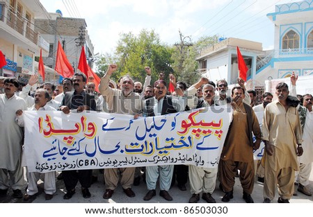QUETTA, PAKISTAN - OCT 12: Supporters of WAPDA Hydro Electric Central Labor Union chant slogans in favor of their demands during protest demonstration on October 12, 2011in Quetta, Pakistan.