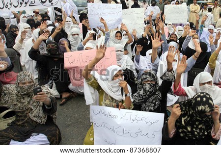 PESHAWAR, PAKISTAN - OCT 21: Khyber-Pakhtoonkhwa Lady Health Workers are protesting in favor of their demands during demonstration on October 21, 2011in Peshawar.