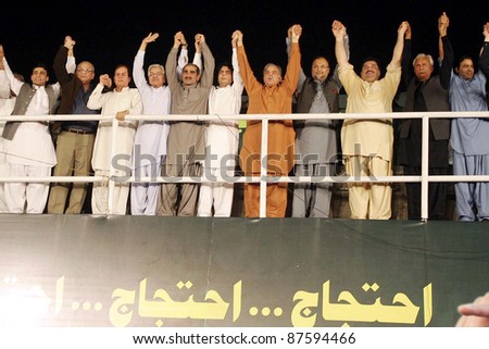 LAHORE, PAKISTAN - OCT 28: Punjab Chief Minister, Shahbaz Sharif and Muslim League-N leaders stand on stage during protest rally on October 28,2011 in Lahore, Pakistan.
