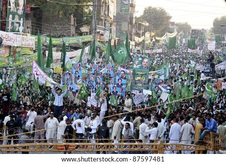 LAHORE, PAKISTAN - OCT 28: Supporters of Muslim League-N chant slogans against President, Asif Ali Zardari during protest rally on October 28, 2011 in Lahore, Pakistan.
