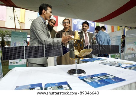 PESHAWAR, PAKISTAN - NOV 22: Students visits stalls on occasion of the Digital Innovation competition and exhibition at Peshawar University of Engineering on November 22, 2011in Peshawar.