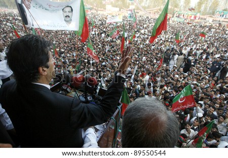 PESHAWAR, PAKISTAN - NOV 25: Tehreek-e-Insaf (PTI) Chairman, Imran Khan addresses to public meeting held at Jhagra village on November 25, 2011in Peshawar.