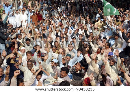 HYDERABAD, PAKISTAN - DEC 08:  WAPDA Hydro Electric Central Labor Union chant slogans against IMF and privatization of power companies during protest rally on December 08, 2011in Hyderabad.