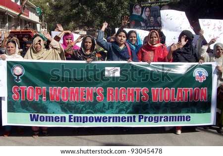 HYDERABAD, PAKISTAN - JAN 18: Supporters of Women Empowerment Programme (an NGO) chant slogans against Women Rights violations during protest rally on January 18, 2012 in Hyderabad.