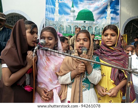 NAUDERO, PAKISTAN - FEB 03: Children recite Naat during Mehfil-e-Milad program in the connection of Jashan-e-Eid Milad-un-Nabi (SAW) held at Govt.Primary School on February 03, 2012 in Naudero, Pakistan.