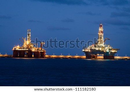 horizontal oil drilling platforms at night in Canary Islands