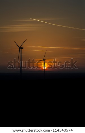 wind turbine in sun-down