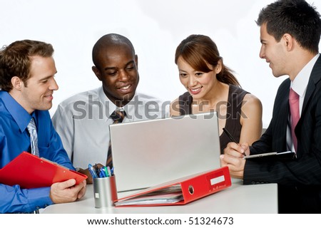 A young and attractive group of professionals having a discussion in their office against white background