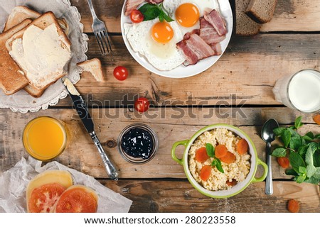 Breakfast composition for country family in the morning. Horizontal top view