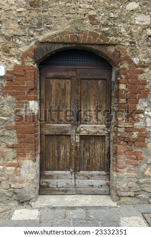 Old wooden door. Italian style. Tuscany