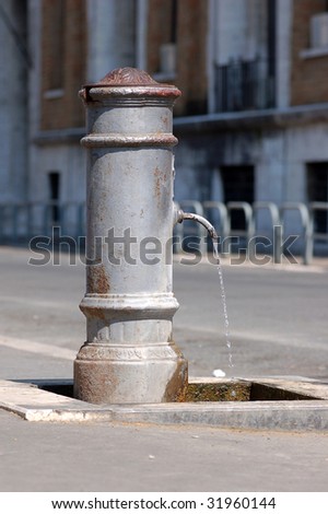 Typical rome fountain. Detail - Classic roman free water public fountain. Rome Italy