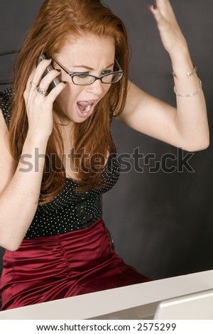 Angry young woman on phone