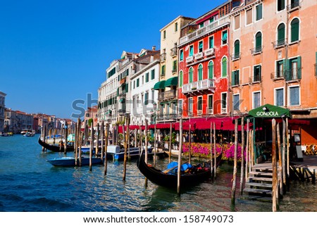 Venice Grand Canal, Italian Canal Grande and gondola small harbor. Old Venetian architecture, boats