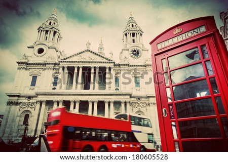 St Paul's Cathedral in London the UK Red bus and telephone booth cloudy sky Symbols of London in vintage retro style St Paul's Cathedral in London the UK Red bus and telephone booth cloudy sky Symbols of London in vintage retro style