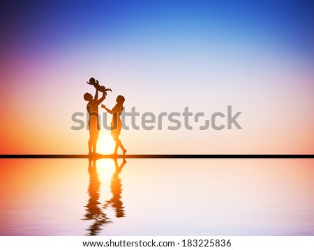 Happy family together, parents celebrating their little child at romantic sunset. Birth, mother, father concepts