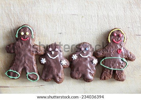 Gingerbread family of four. Handmade in home, decorated by children. Christmas