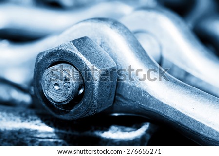 Industrial wrench, spanner in workshop. Industry theme, engineering.