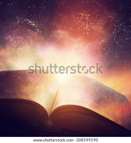 Open old book merged with magic galaxy sky, universe, stars. Concept of literature, fantasy, horoscope, religion etc.