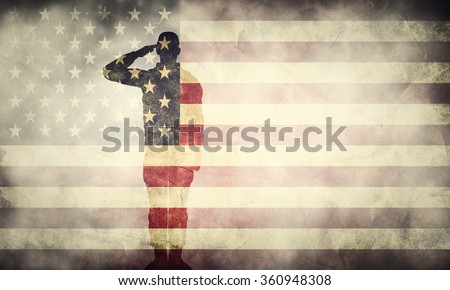 Double exposure of saluting soldier on USA grunge flag. Vintage, retro style. Patriotic design