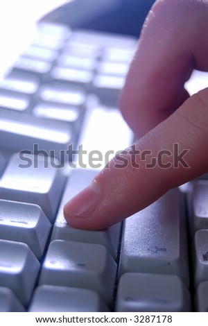 Typing on keyboard close up