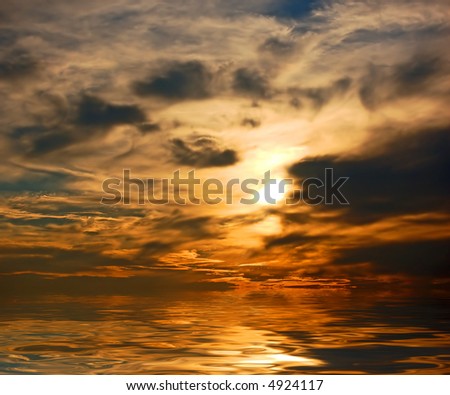 Picture of dramatic sunset sky above ocean
