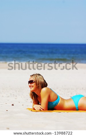 Beautiful woman relaxing on the beach