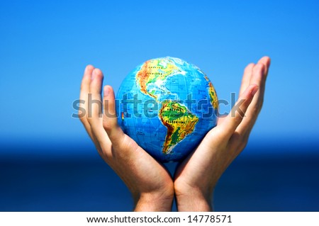 Earth globe in hands protected. Ideal for Earth protection concepts, recycling, world issues, enviroment themes